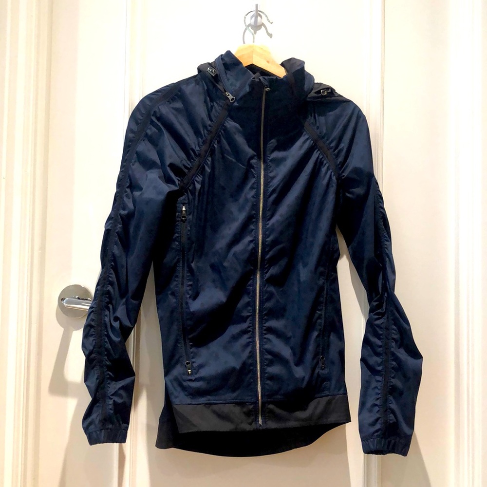 New-condition Lululemon windbreaker with hood